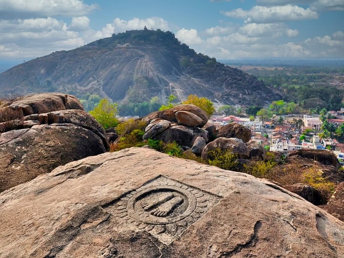 Carved footprint of Chandragupta Maurya on rock