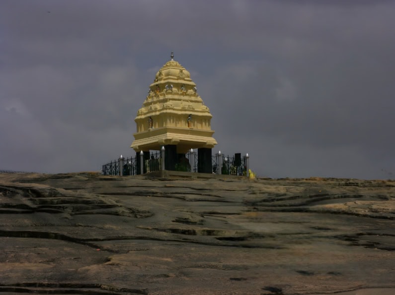 Kempegowda Tower against a cloudy sky in Bangalore